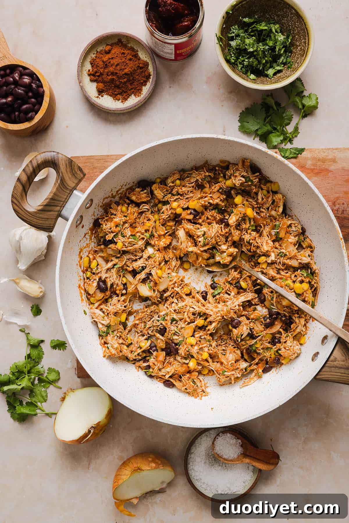 This Healthy Chicken Enchilada recipe is a family favorite made with wholesome, flavorful ingredients for the perfect weeknight meal! The homemade enchilada sauce tastes absolutely amazing! 