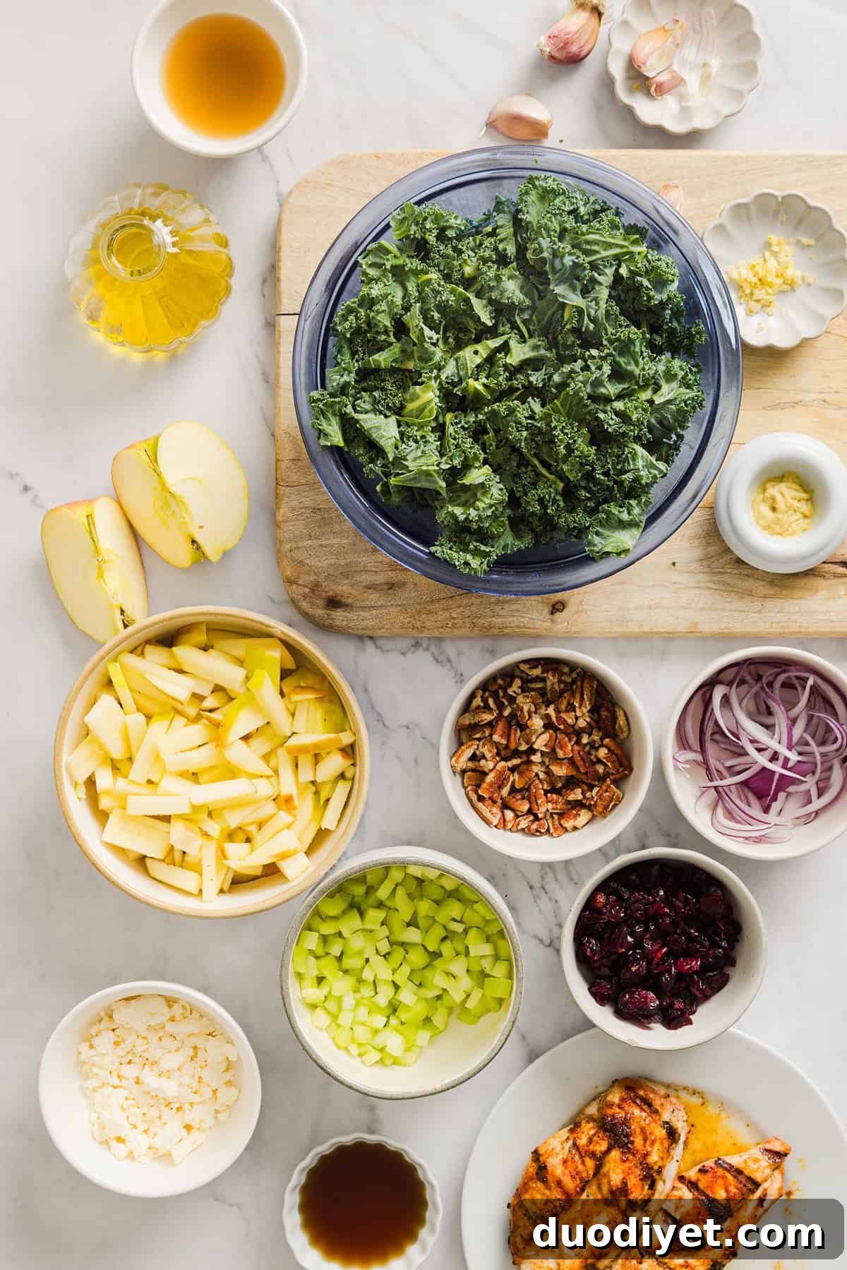 Autumn Harvest Chopped Chicken Salad with Cranberries, Pecans 3 Chopped kale, chicken, apples, pecans and feta tossed in dressing for a harvest salad