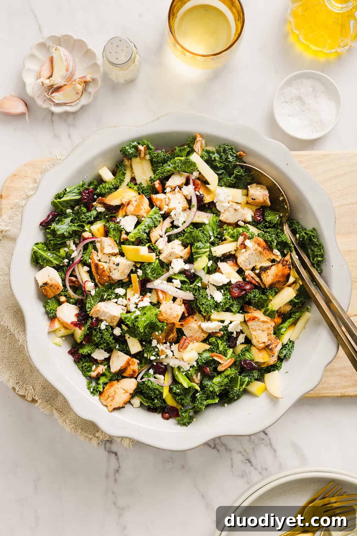 This fresh and flavorful Harvest Chopped Chicken Salad is made with leafy kale, tender juicy chicken, chopped apples and crunchy pecans all tossed with a maple dijon dressing! This salad is hearty enough for dinner and light enough for lunch!