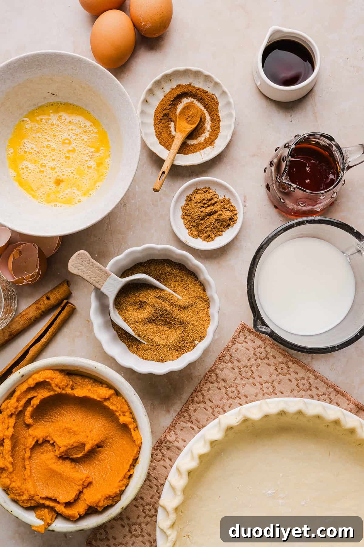 This creamy and delicious Healthy Pumpkin Pie makes the perfect holiday dessert! So easy to make, naturally sweetened with maple syrup and tastes great topped with whipped cream or vanilla ice cream!