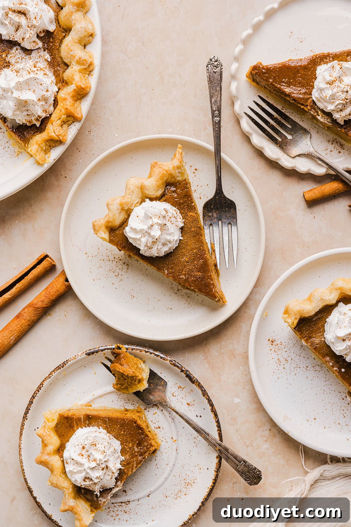 This creamy and delicious Healthy Pumpkin Pie makes the perfect holiday dessert! So easy to make, naturally sweetened with maple syrup and tastes great topped with whipped cream or vanilla ice cream!