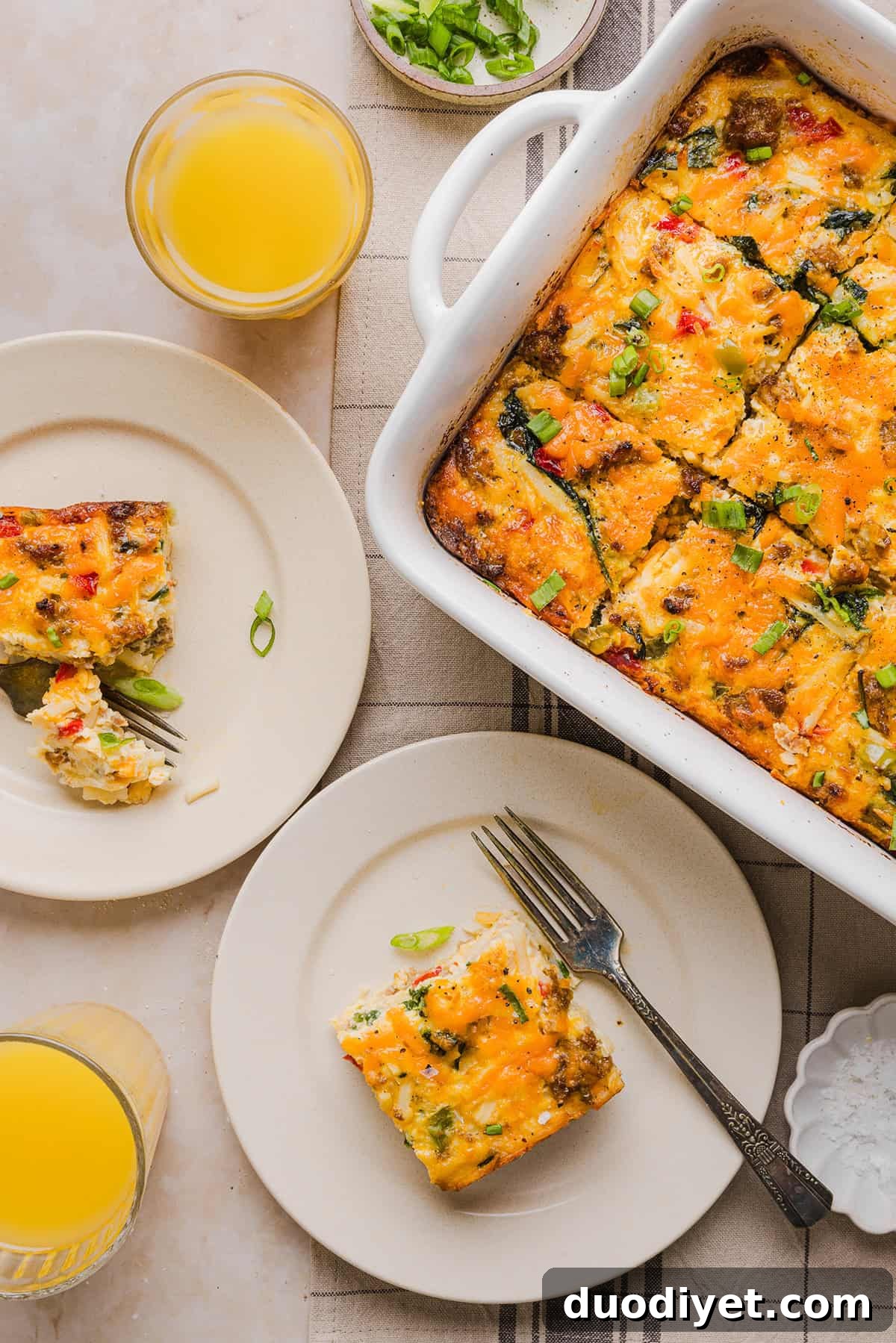 This Easy Hash Brown Breakfast Casserole is loaded with savory sausage, sautéed peppers and onions, along with melty cheese and perfectly seasoned eggs. The perfect recipe for your holiday brunch or weekend breakfast that can easily be prepped the night before!