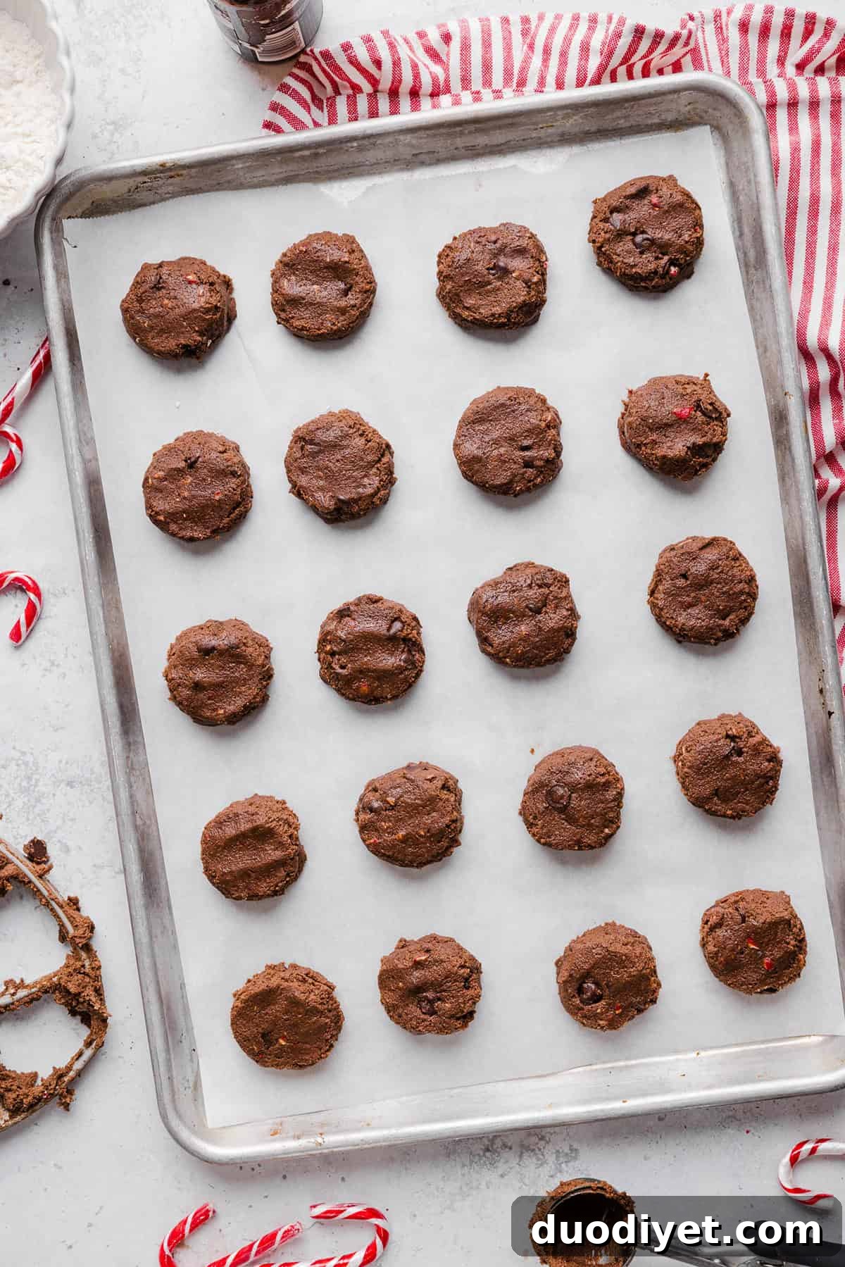 Stack of chocolate peppermint cookies with candy cane pieces