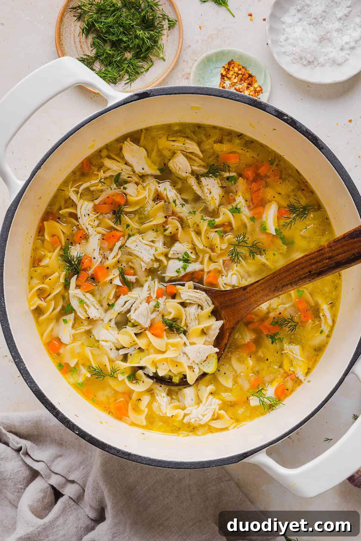 Enjoy a cozy bowl of this Easy Chicken Noodle Soup made with simple ingredients that pack in the flavor! Made with tender chicken, hearty vegetables and a rich, flavorful broth that is comforting and nourishing.