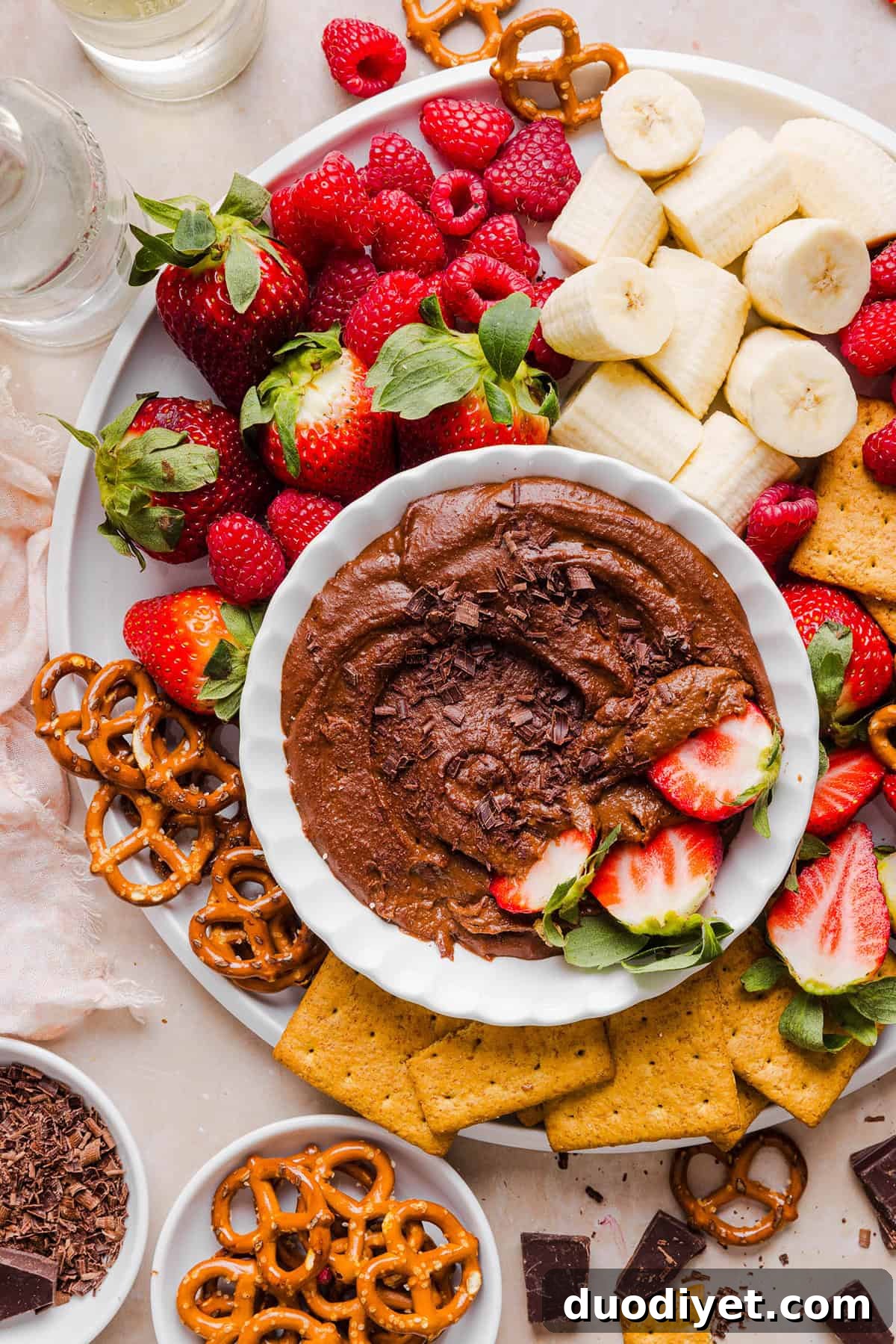 Chocolate Hummus Recipe: Creamy Cocoa Dessert Dip 6 This Healthy Chocolate Hummus is rich and indulgent to satisfy your sweet tooth, but made with wholesome ingredients that you can feel good about eating! Serve with your favorite fruit, pretzels or graham crackers for the perfect fun dessert or snack!