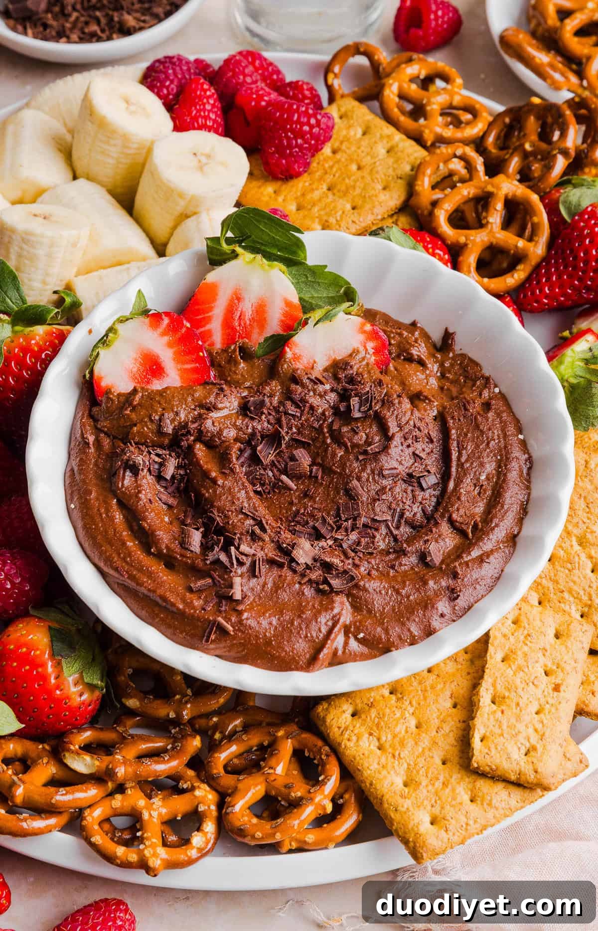 Chocolate Hummus Recipe: Creamy Cocoa Dessert Dip 7 This Healthy Chocolate Hummus is rich and indulgent to satisfy your sweet tooth, but made with wholesome ingredients that you can feel good about eating! Serve with your favorite fruit, pretzels or graham crackers for the perfect fun dessert or snack!
