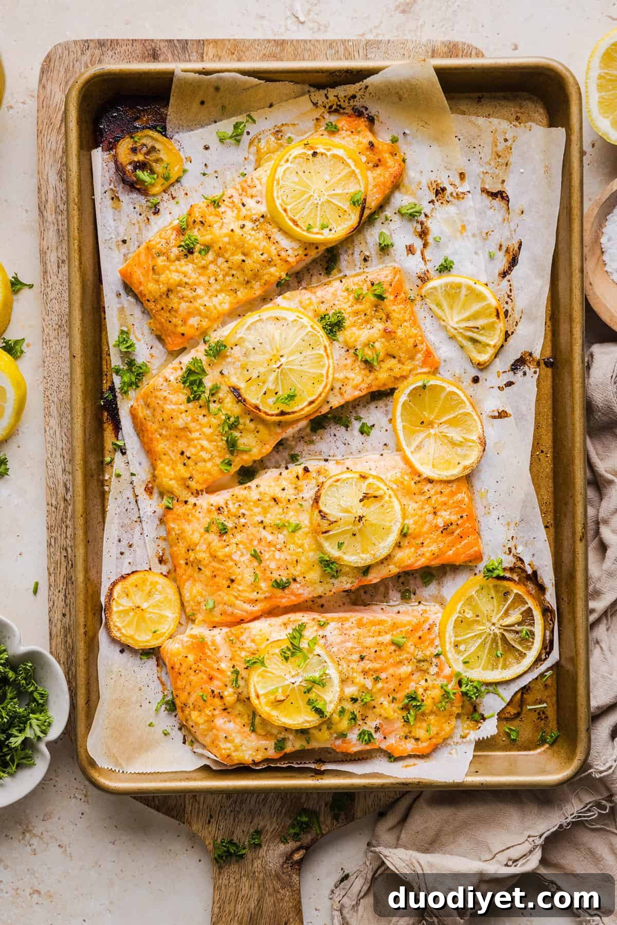 Oven-Baked Garlic Butter Salmon 4 Close up of Garlic Butter Baked Salmon with lemon