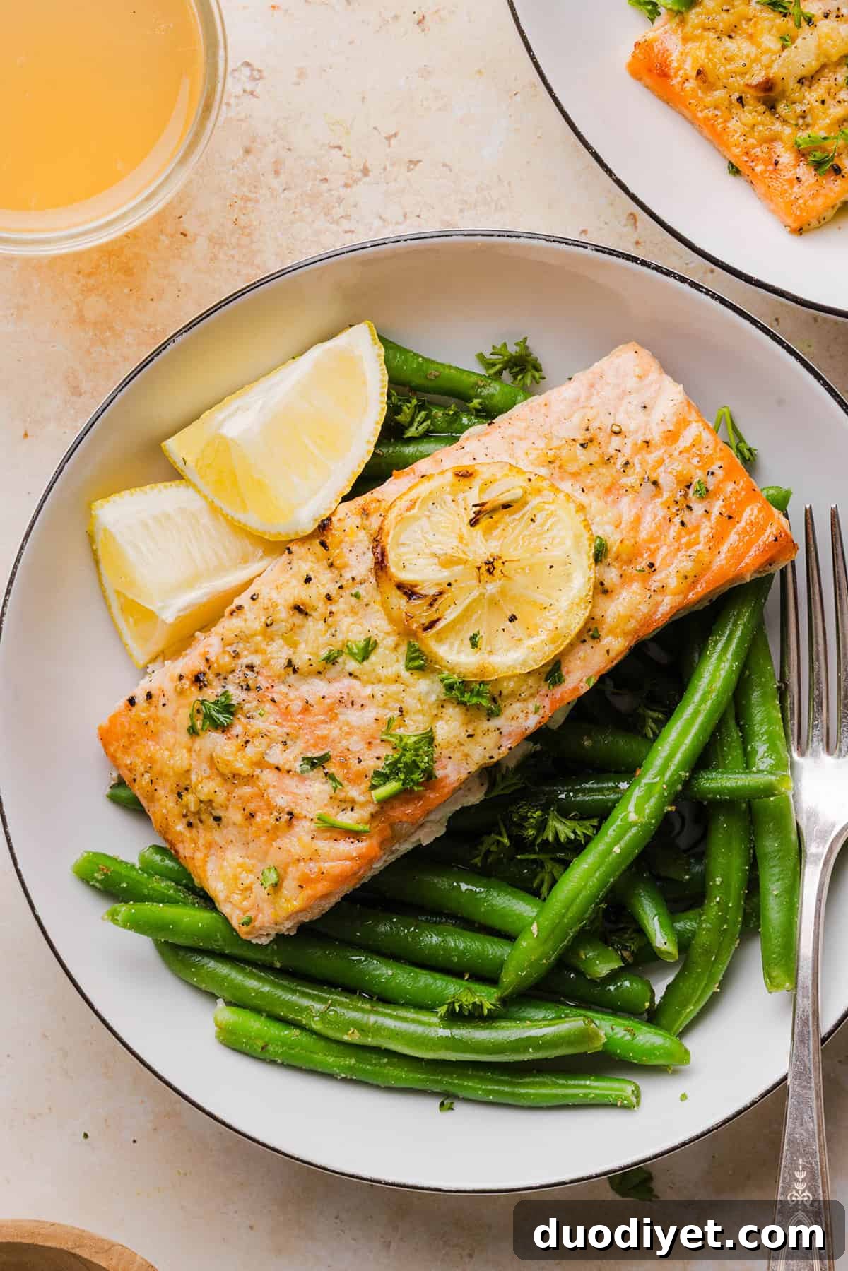 Oven-Baked Garlic Butter Salmon 5 Baked salmon fillets with garlic butter sauce