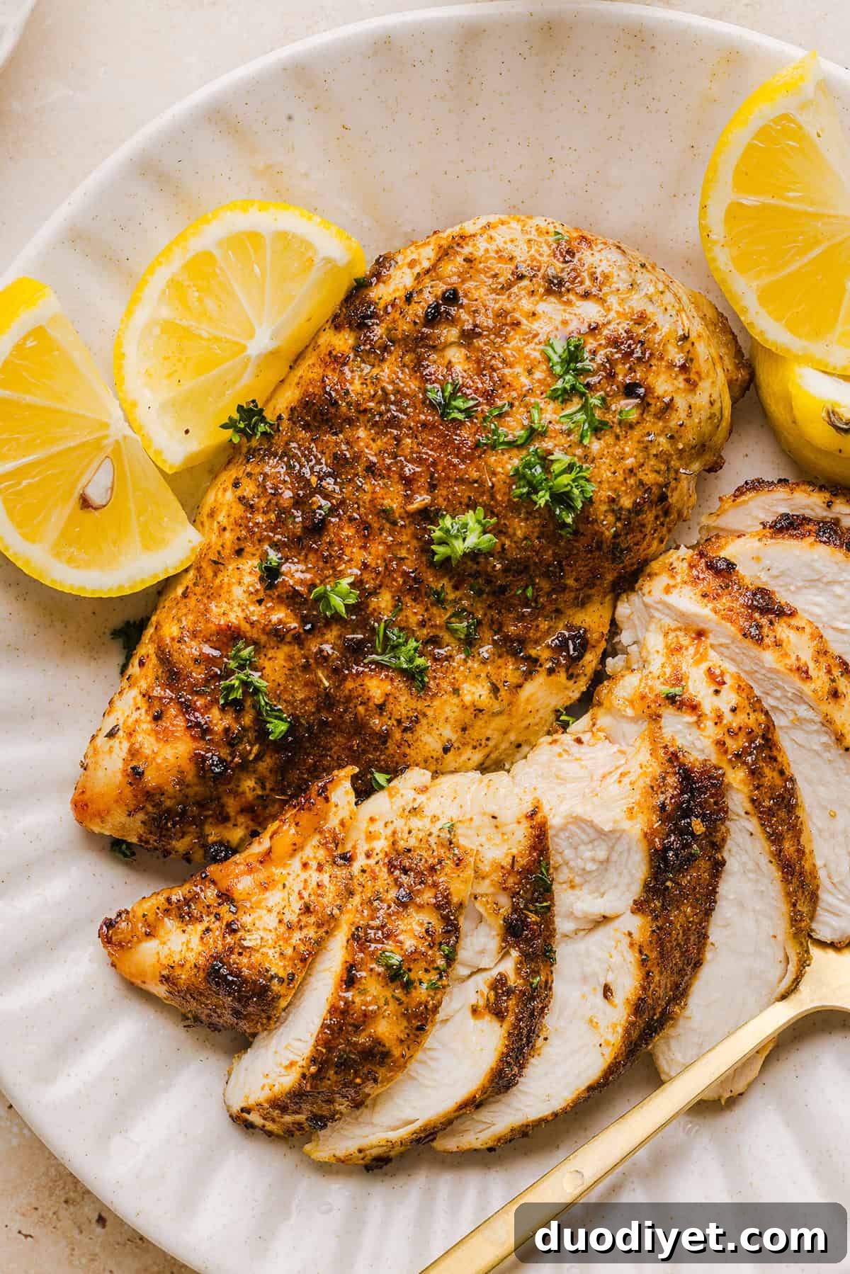 Juicy air fryer chicken breast, seasoned and ready to serve.
