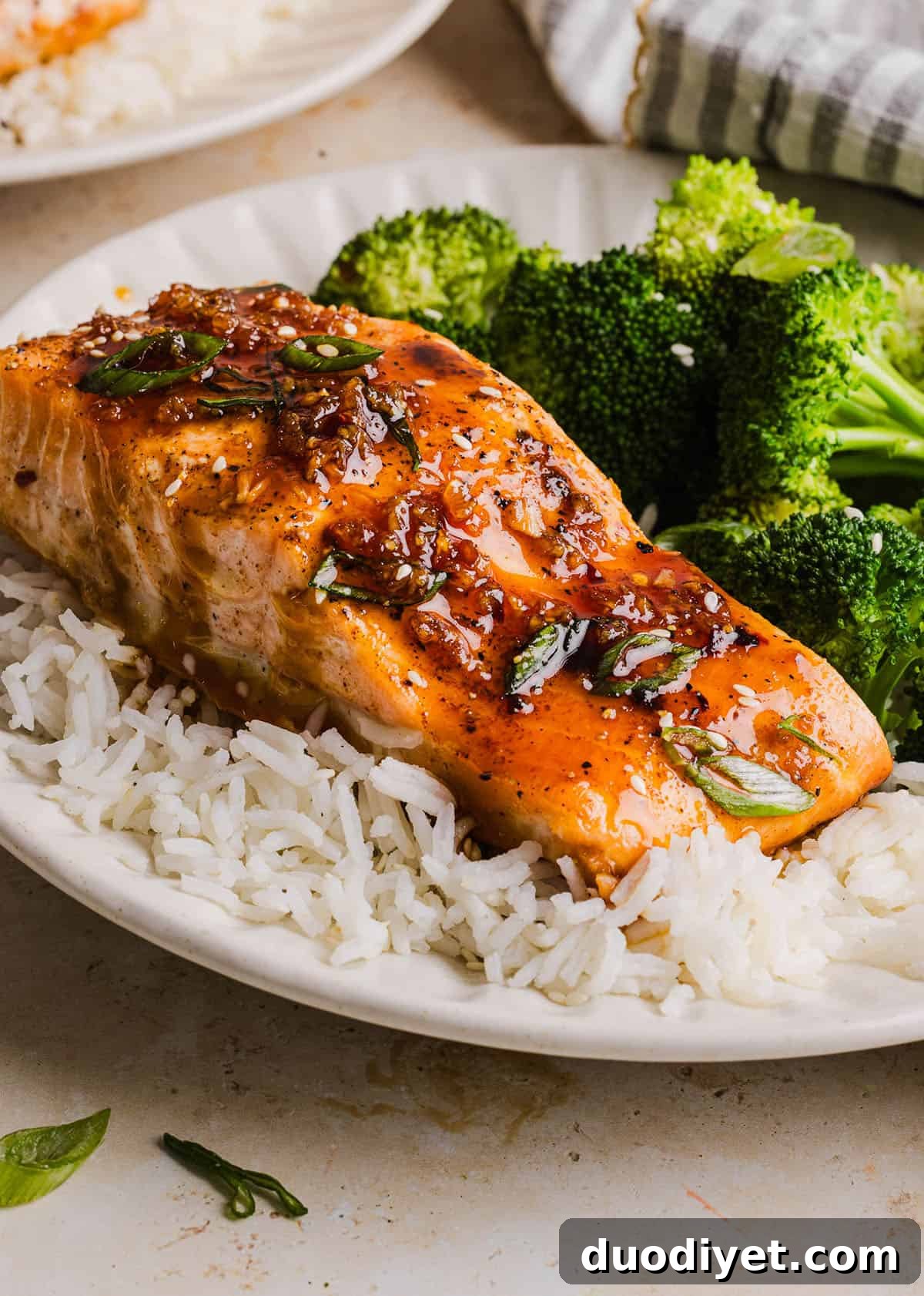 Hot Honey Salmon served on a bed of rice with vegetables