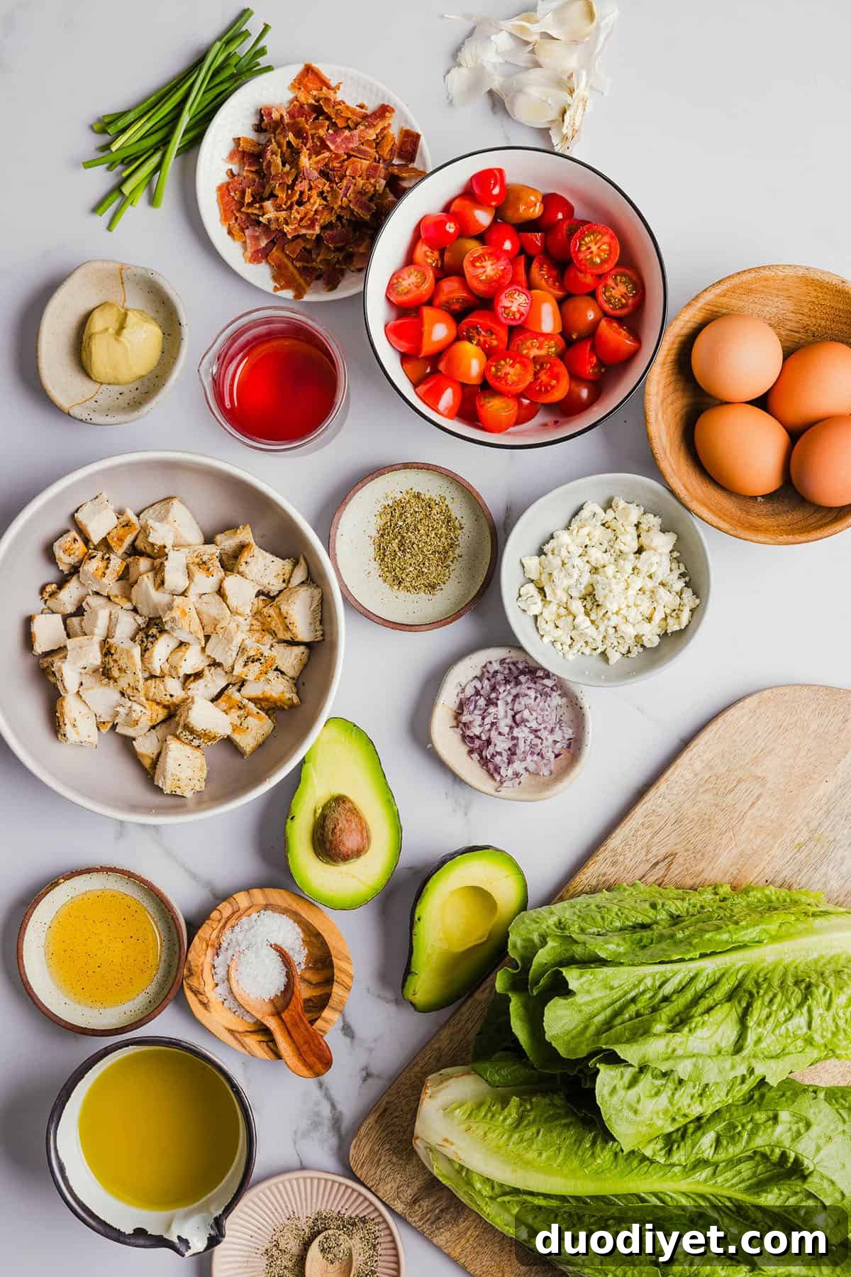 Chicken Cobb Salad with chicken, bacon, avocado and blue cheese on romaine greens