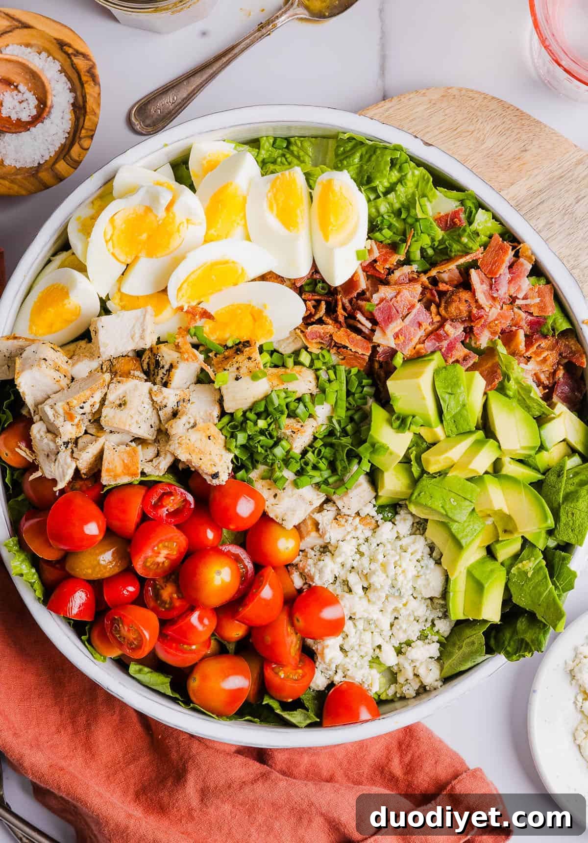 6 Creative Ways to Use Hard-Boiled Eggs 4 This Chicken Cobb Salad is a hearty, protein-packed meal loaded with juicy chicken, crisp veggies, creamy avocado, and perfectly cooked hard-boiled eggs. A great way to use up leftover eggs and add extra flavor and richness to this easy, satisfying salad.
