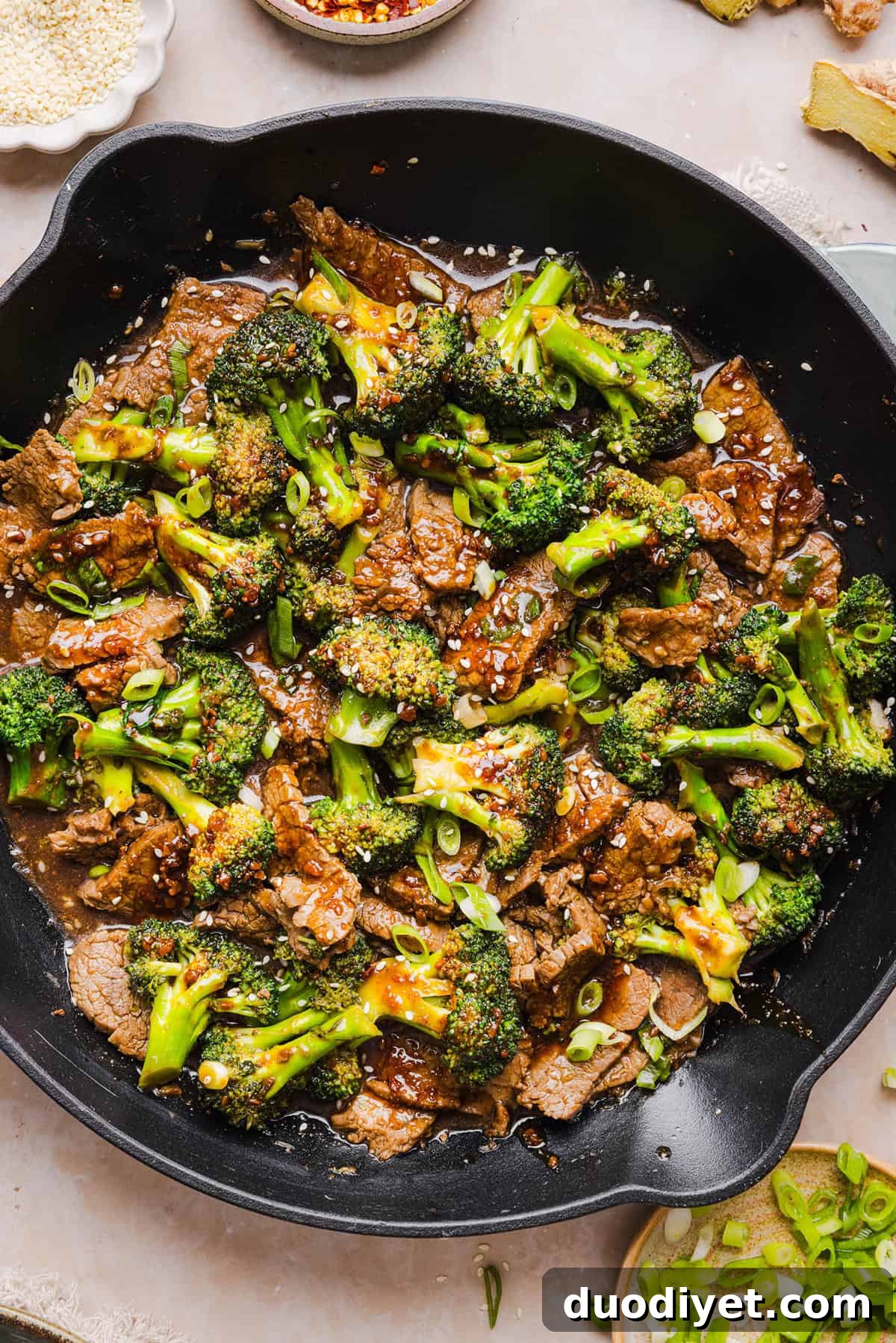 You'll love this Healthy Beef and Broccoli recipe made with tender flank steak, crisp broccoli and a savory garlic ginger sauce. A quick and easy weeknight dinner that tastes better than take-out and comes together in under 30 minutes!
