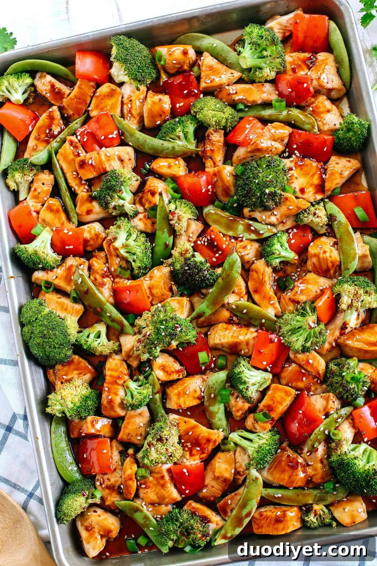 This Sheet Pan Sesame Chicken and Veggies makes the perfect weeknight dinner that’s healthy, delicious and easily made all on one pan in under 30 minutes!  Perfect recipe for your Sunday meal prep too!  