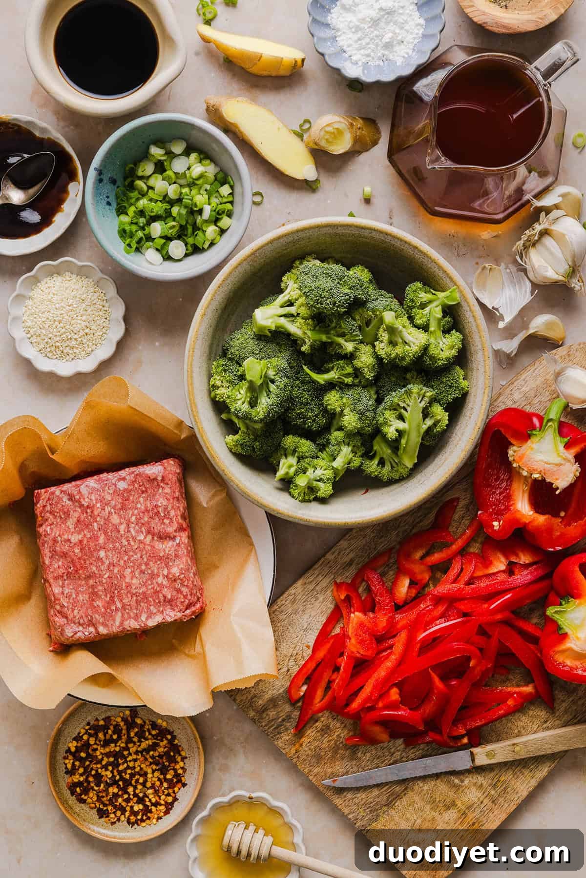 Healthy Mongolian Ground Beef Bowls with sticky glossy sauce and vegetables.
