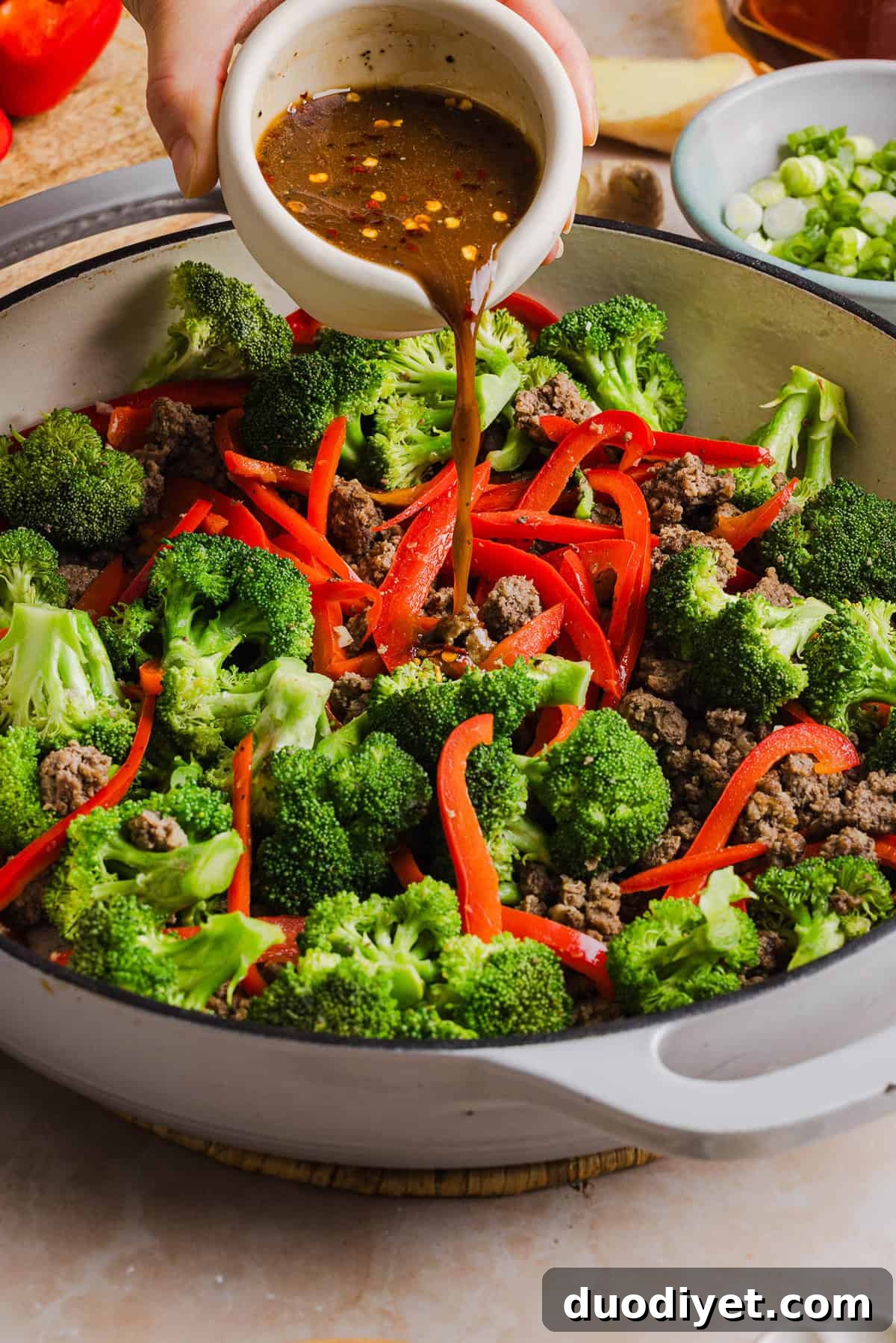 Prepared ingredients: ground beef, broccoli, bell pepper, and sauce components.