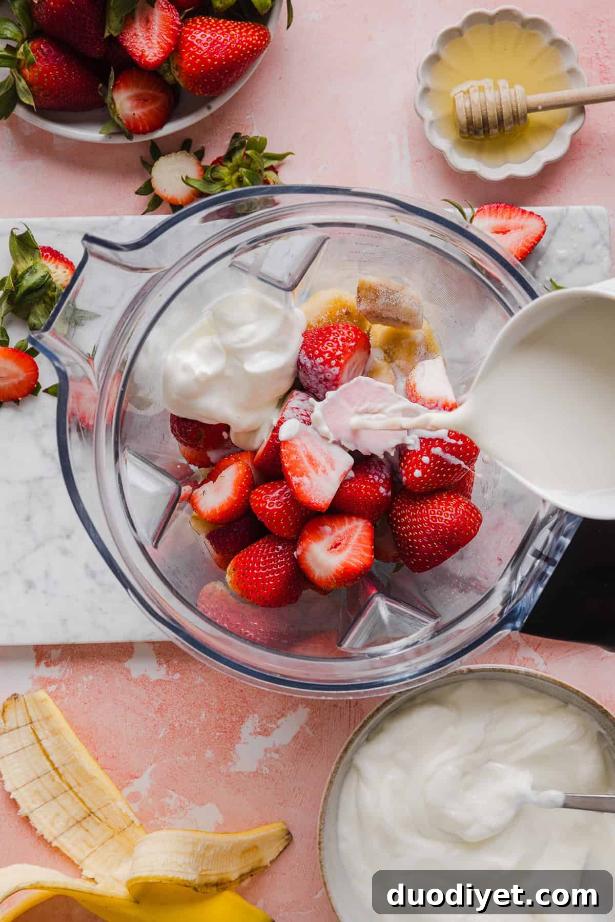 Creamy Strawberry Banana Smoothie Recipe 4 Fresh strawberries and a banana for a smoothie