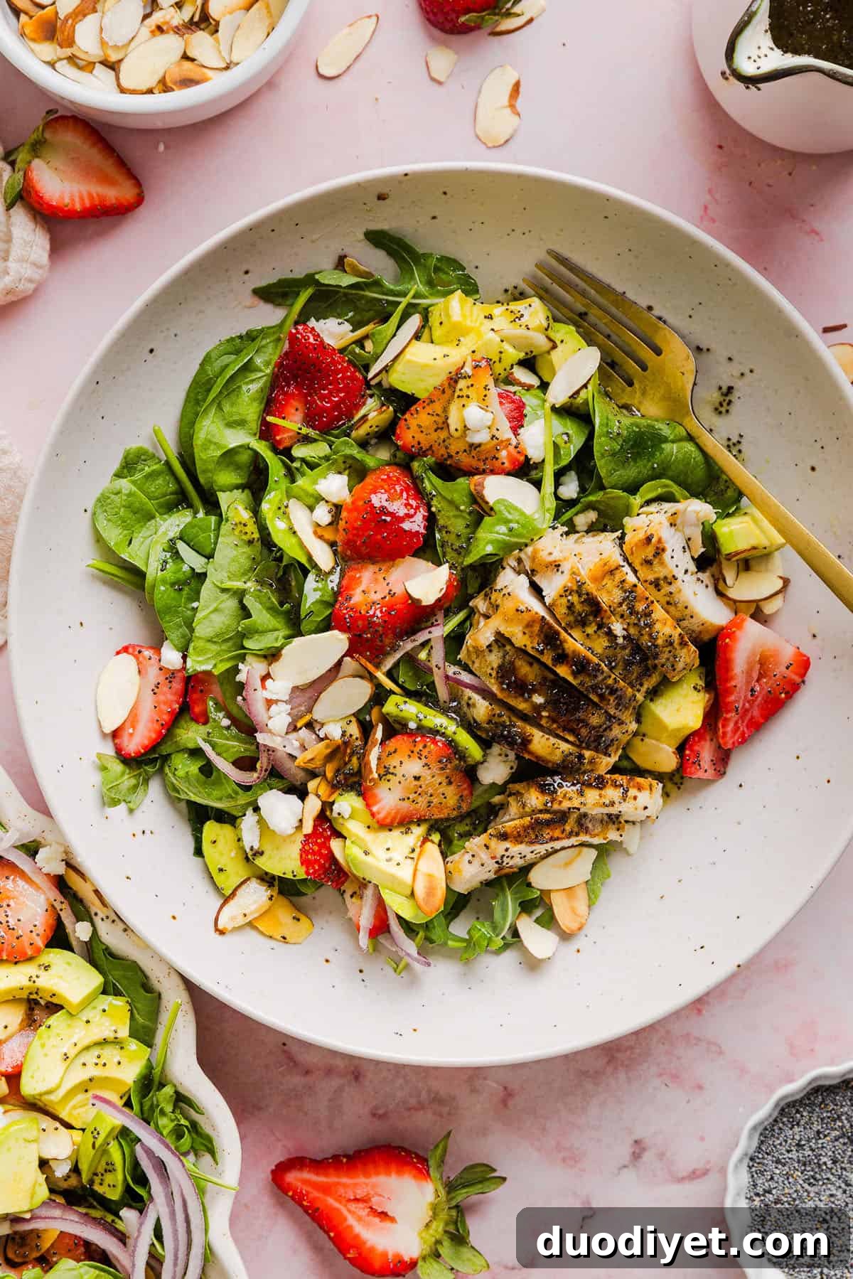 Strawberry Poppy Seed Chicken Salad close-up with avocado and almonds