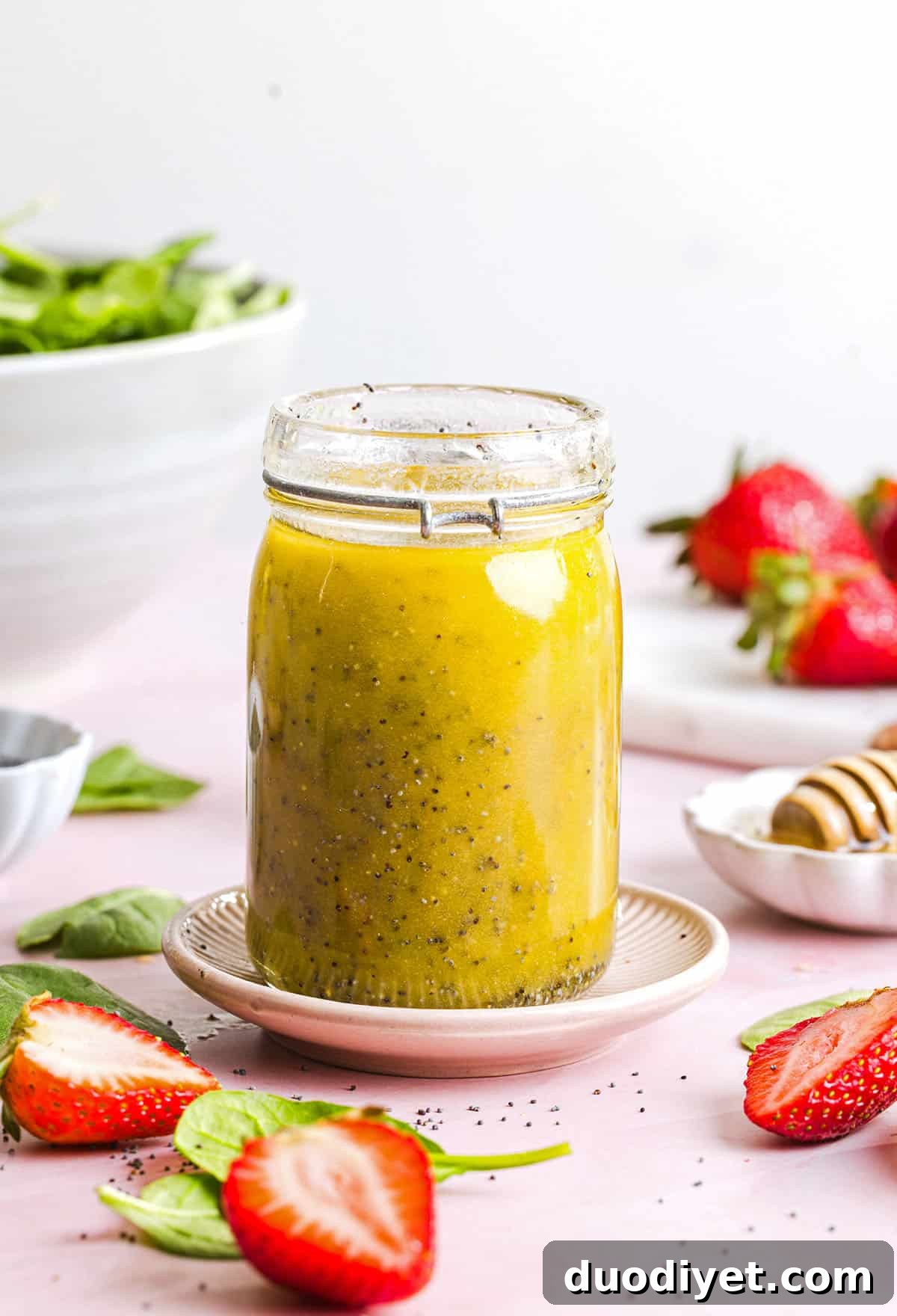 This Poppy Seed Dressing recipe is light, sweet and perfectly tangy made with simple ingredients in just 5 minutes! The perfect addition to fresh salads, fruit, or grilled chicken and tastes so much better than store-bought.