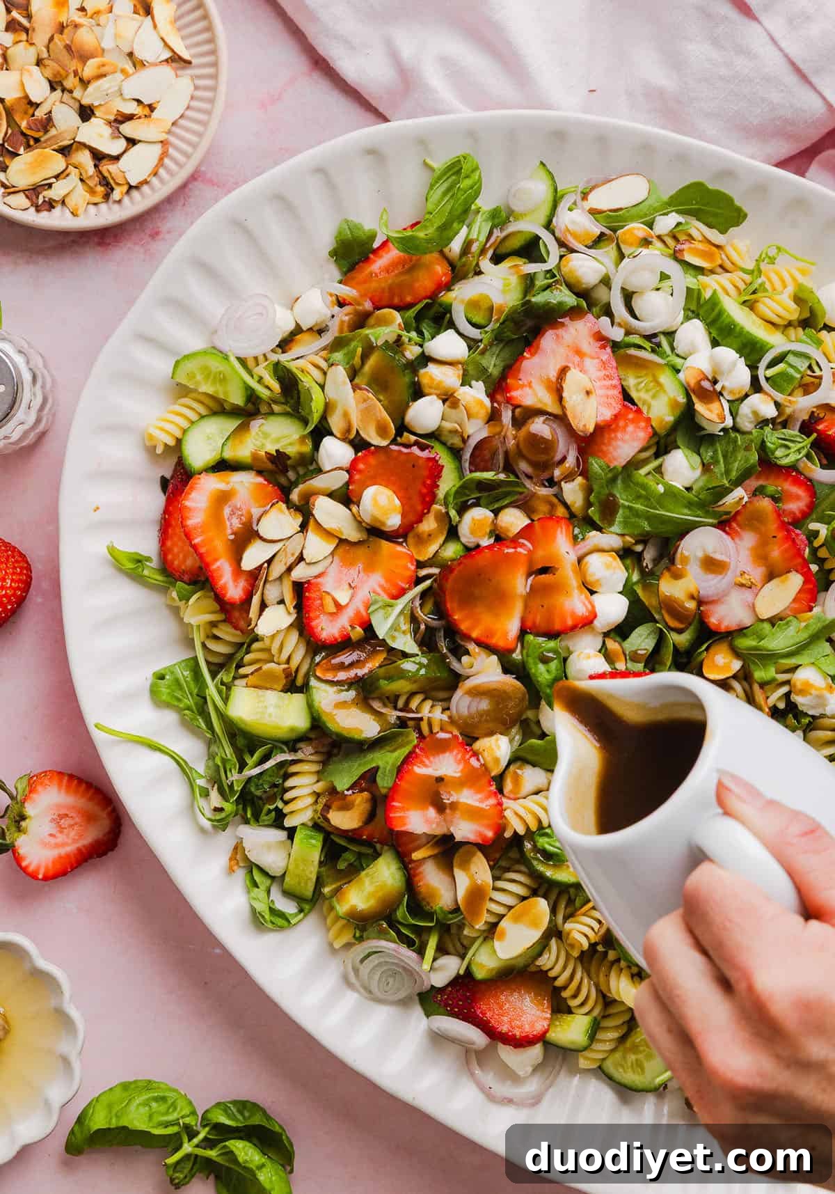 Strawberry Balsamic Pasta Salad Recipe 5 Strawberry Balsamic Pasta Salad served in a bowl with fresh basil