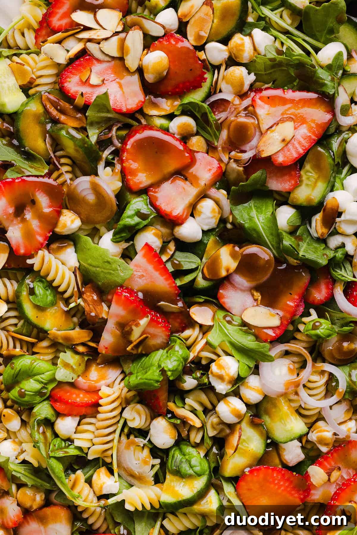 Strawberry Balsamic Pasta Salad Recipe 6 A serving of Strawberry Balsamic Pasta Salad with toasted almonds on top