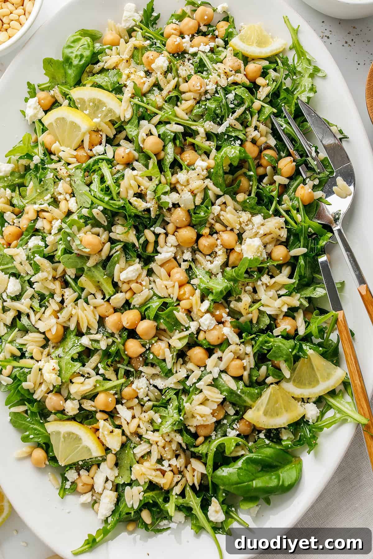 Zesty Lemon Arugula Orzo Salad 2 Lemon Arugula Orzo Salad - bright, zesty pasta salad with arugula, orzo, chickpeas, feta, and lemon dressing