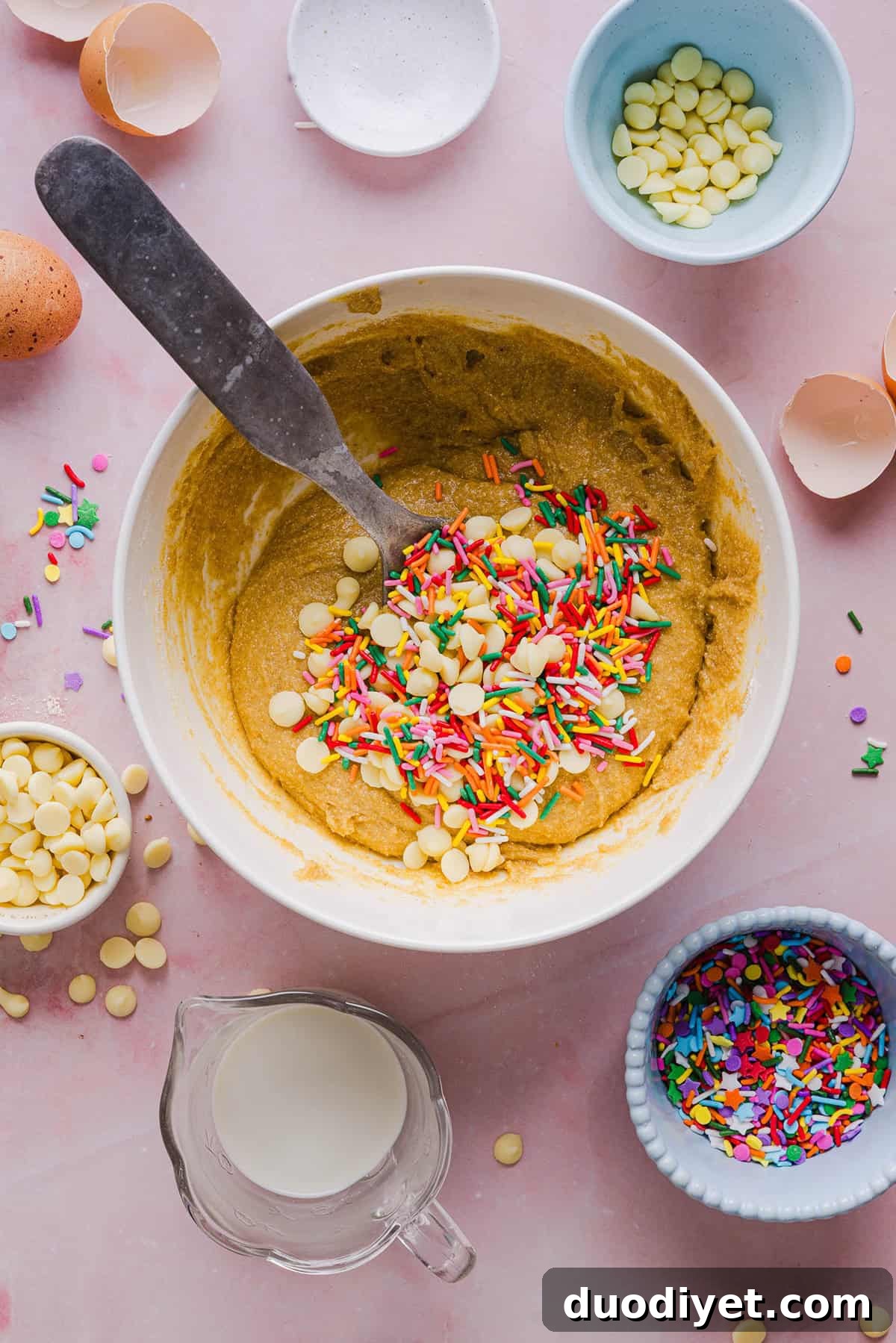 Soft and chewy Healthy Funfetti Cookie Bars that taste like birthday cake batter! Made healthier with whole wheat flour, less butter and zero refined sugar for the perfect lightened-up party dessert!
