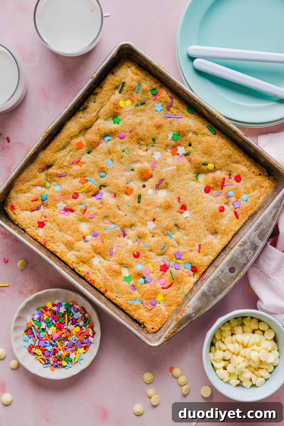 Soft and chewy Healthy Funfetti Cookie Bars that taste like birthday cake batter! Made healthier with whole wheat flour, less butter and zero refined sugar for the perfect lightened-up party dessert!