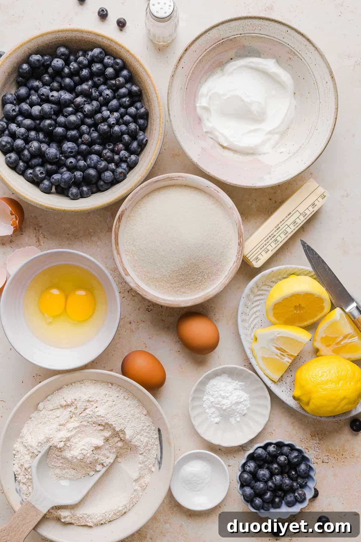 These Lemon Blueberry Yogurt Muffins are soft, moist and bursting with fresh lemon flavor and juicy blueberries! Made with Greek yogurt and wholesome ingredients, they are perfect for breakfast, snacks or meal prep.
