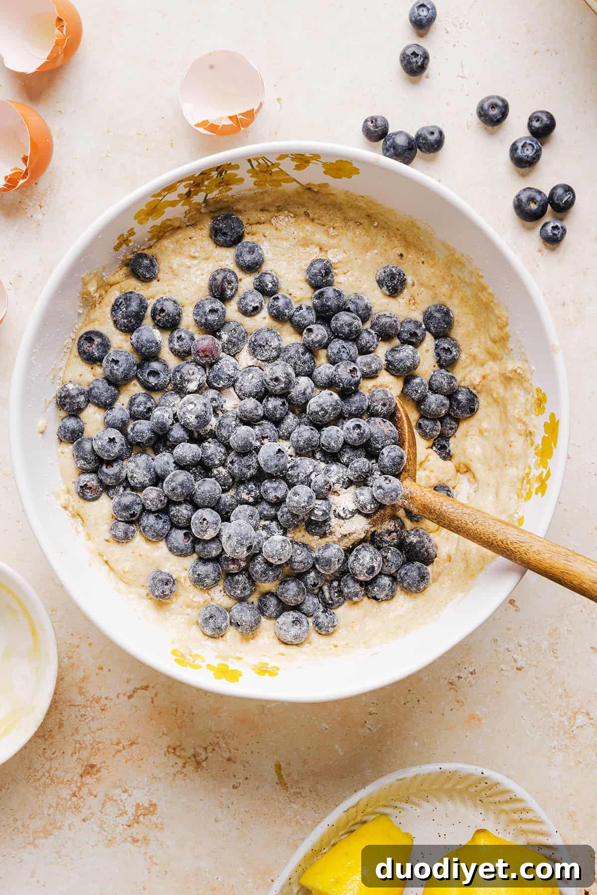 These Lemon Blueberry Yogurt Muffins are soft, moist and bursting with fresh lemon flavor and juicy blueberries! Made with Greek yogurt and wholesome ingredients, they are perfect for breakfast, snacks or meal prep.