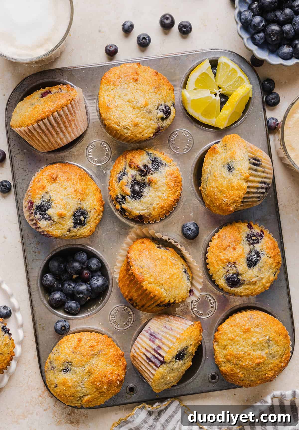These Lemon Blueberry Yogurt Muffins are soft, moist and bursting with fresh lemon flavor and juicy blueberries! Made with Greek yogurt and wholesome ingredients, they are perfect for breakfast, snacks or meal prep.