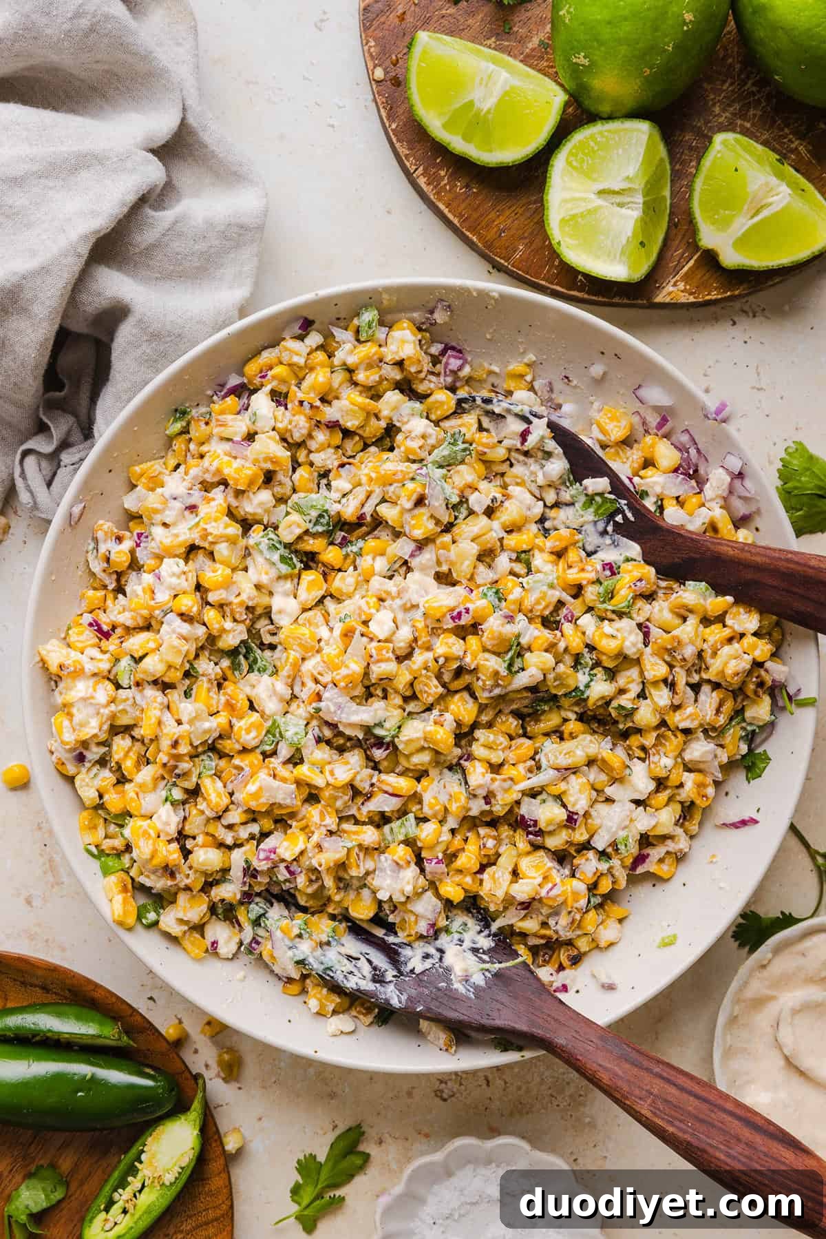 Zesty Mexican Street Corn Elote Salad with Lime and Cotija 6 Served Mexican street corn salad with lime wedges