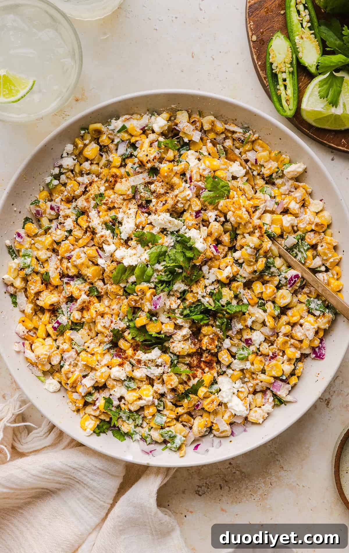 Zesty Mexican Street Corn Elote Salad with Lime and Cotija 8 Fresh Mexican street corn salad with cilantro garnish