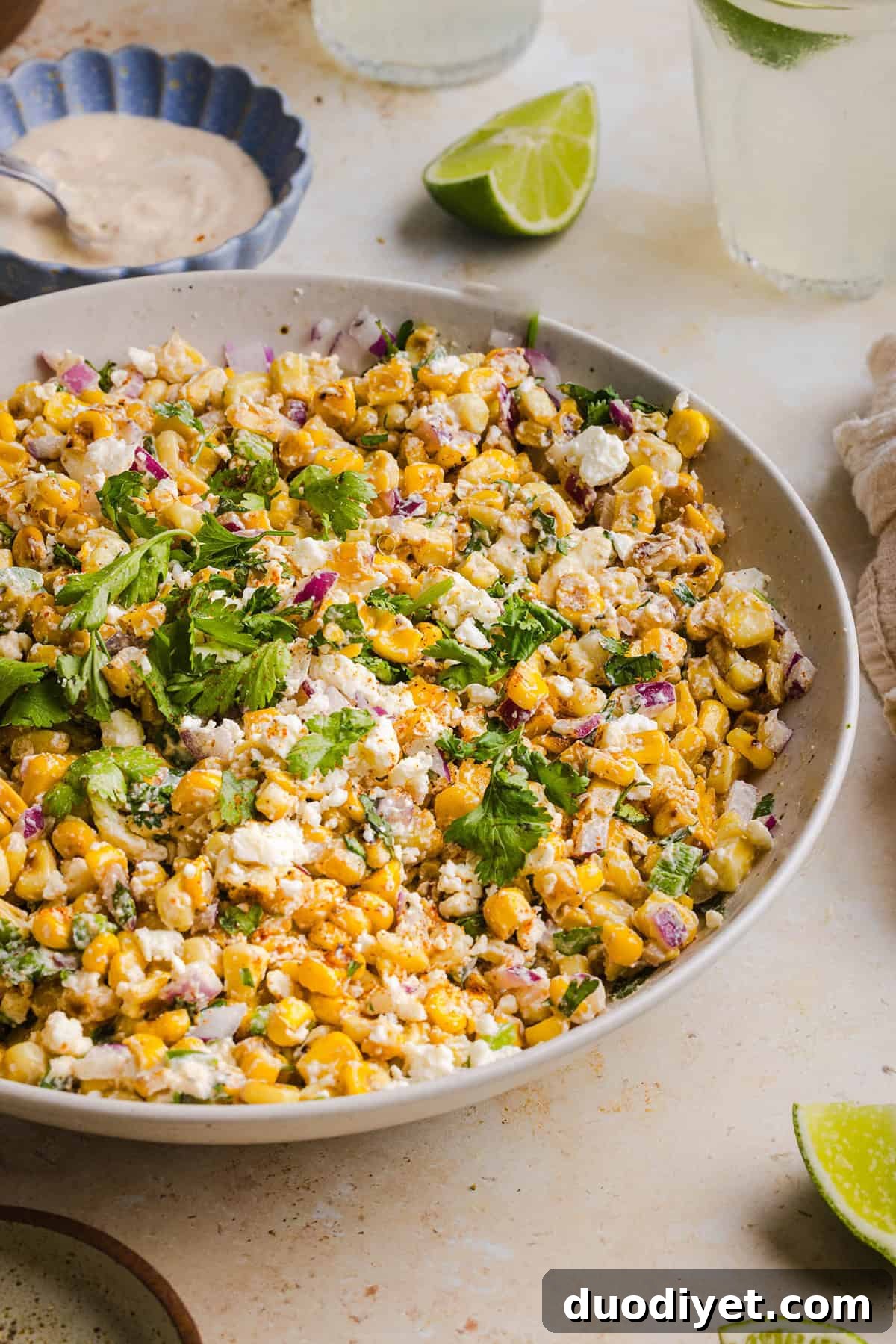 Zesty Mexican Street Corn Elote Salad with Lime and Cotija 9 Meal prep containers with Mexican street corn salad