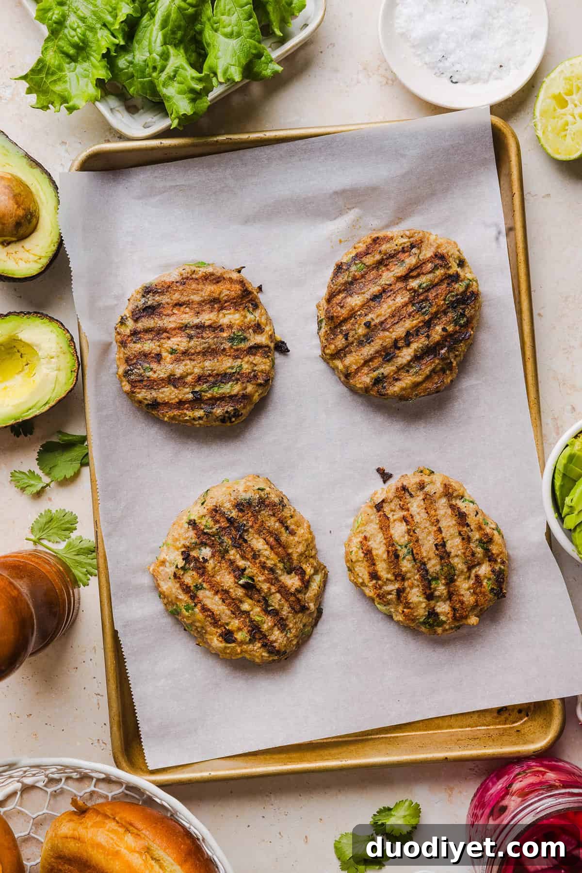 Grilled Cilantro Lime Chicken Burgers 4 These Cilantro Lime Chicken Burgers are juicy, flavorful, and topped with a creamy avocado cilantro sauce. Made with lean ground chicken, fresh cilantro, green onions, and lime zest, these burgers are perfect for summer grilling or an easy weeknight meal!