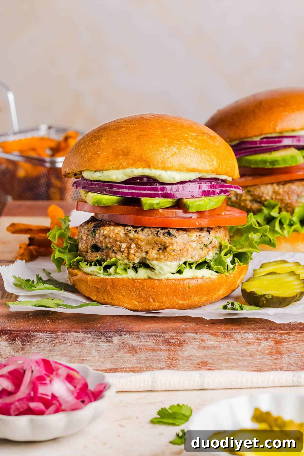 Grilled Cilantro Lime Chicken Burgers 7 These Cilantro Lime Chicken Burgers are juicy, flavorful, and topped with a creamy avocado cilantro sauce. Made with lean ground chicken, fresh cilantro, green onions, and lime zest, these burgers are perfect for summer grilling or an easy weeknight meal!