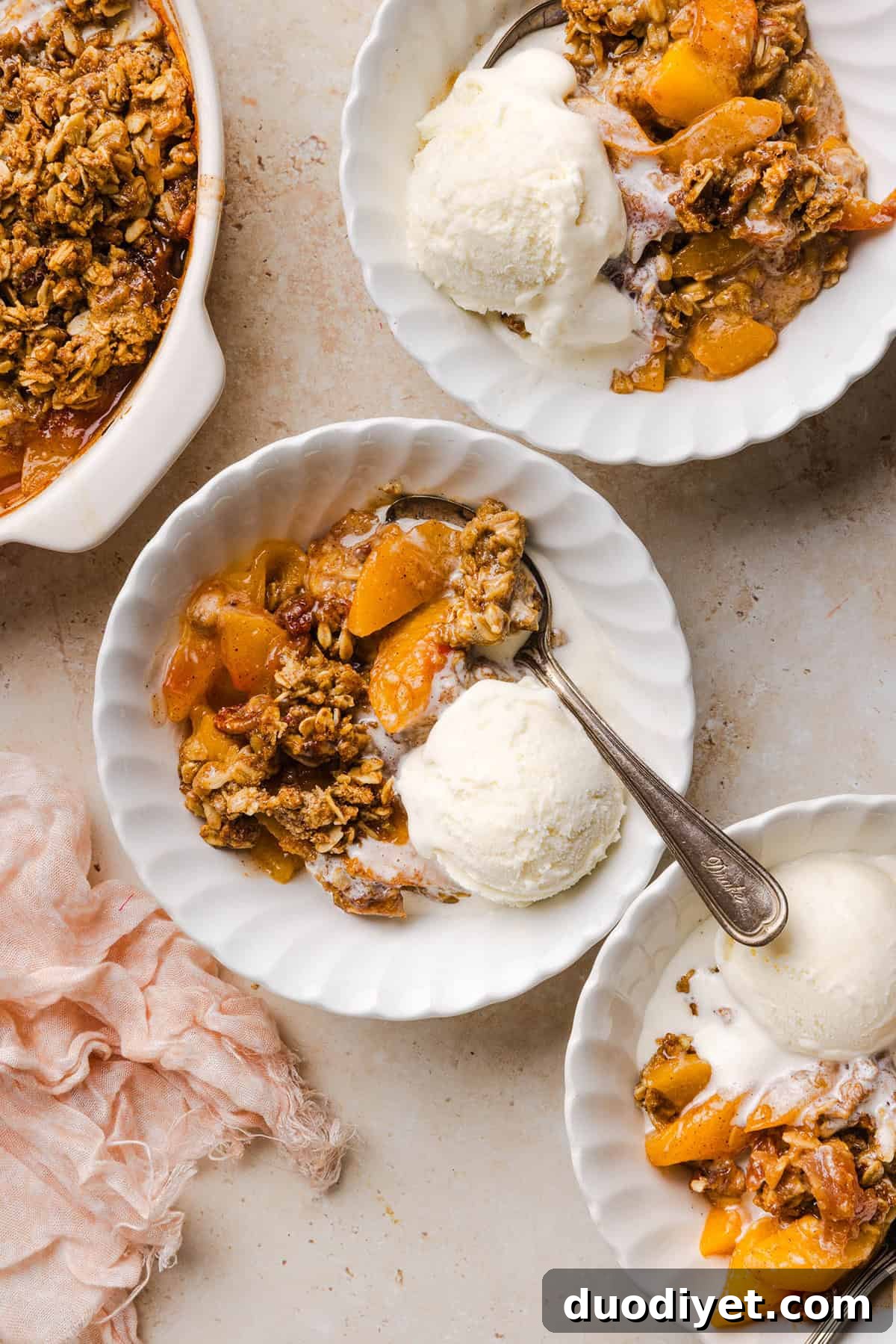 Healthy Peach Crisp with oat pecan crumble