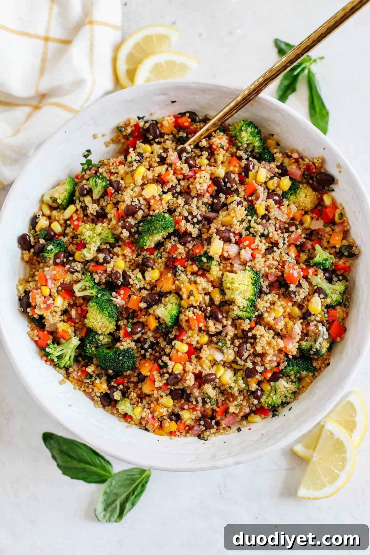 Refreshing Summer Quinoa Salad with Lemon, Cucumber and Feta 2 The perfect Summer Quinoa Salad made with a delicious combination of sautéed veggies, black beans, corn, and fresh basil all tossed with a lemon balsamic dressing!
