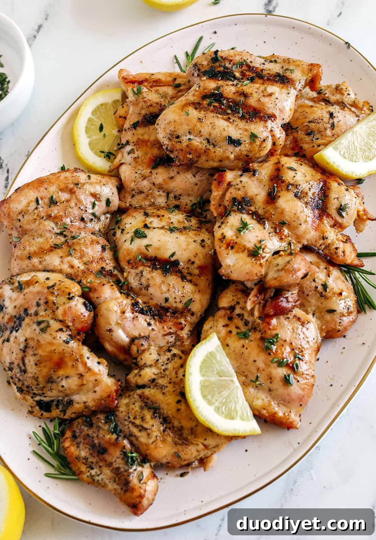 This Lemon Herb Grilled Chicken is easily made with just a few simple ingredients for a delicious, healthy meal!  Packed with so much flavor thanks to tangy lemon juice, tons of garlic, and fresh thyme!