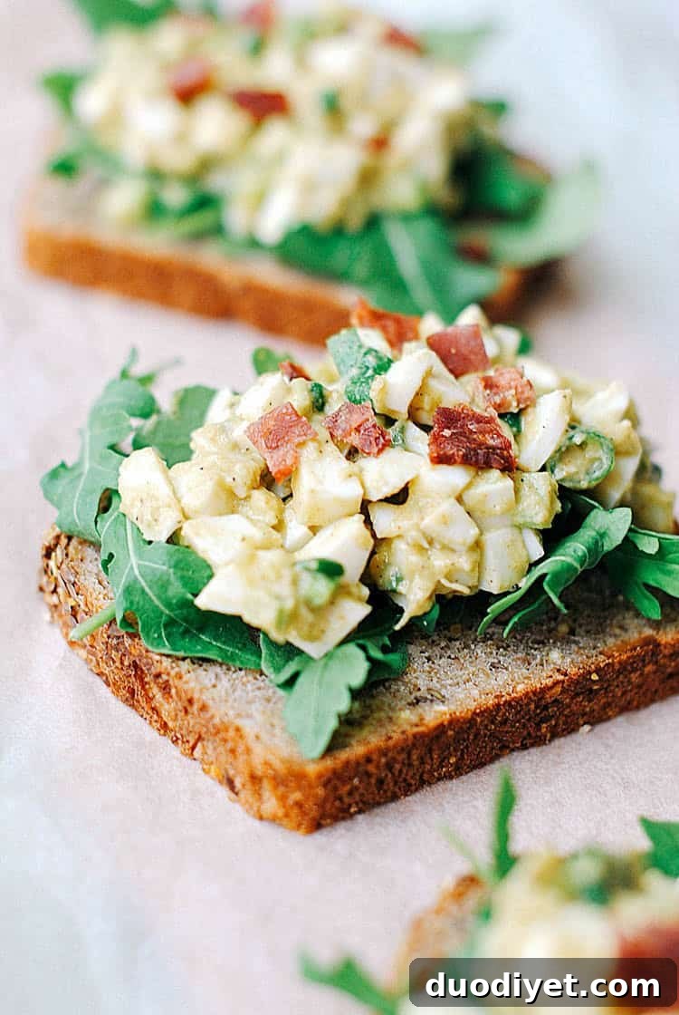 Egg White and Avocado Salad served open-faced on whole wheat with arugula