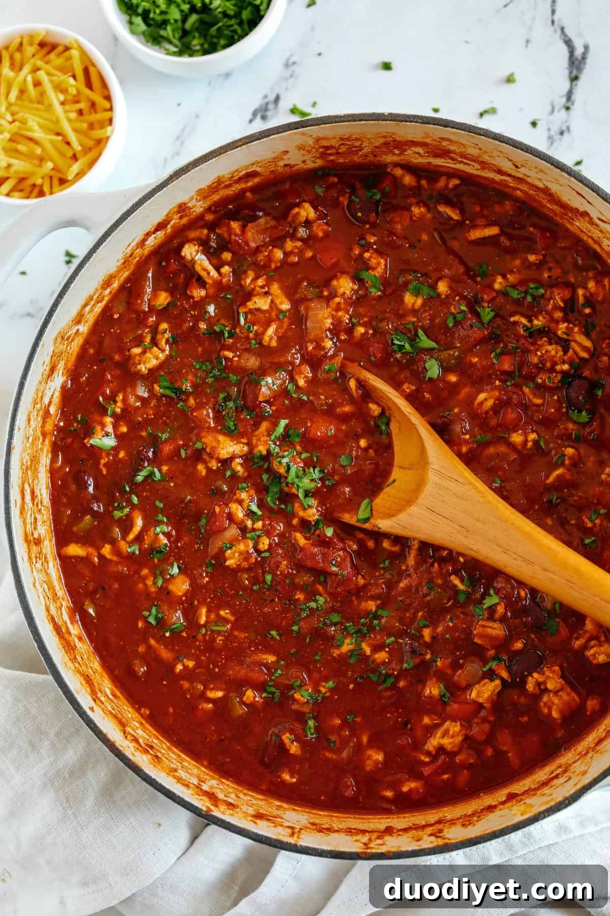 Ground Turkey Chili Recipe with Beans and Vegetables 3 The BEST Healthy Turkey Chili recipe full of fresh veggies, lean ground turkey and loaded with flavor! The perfect cozy chili you can easily make in our instant pot, crock pot or right on the stove!