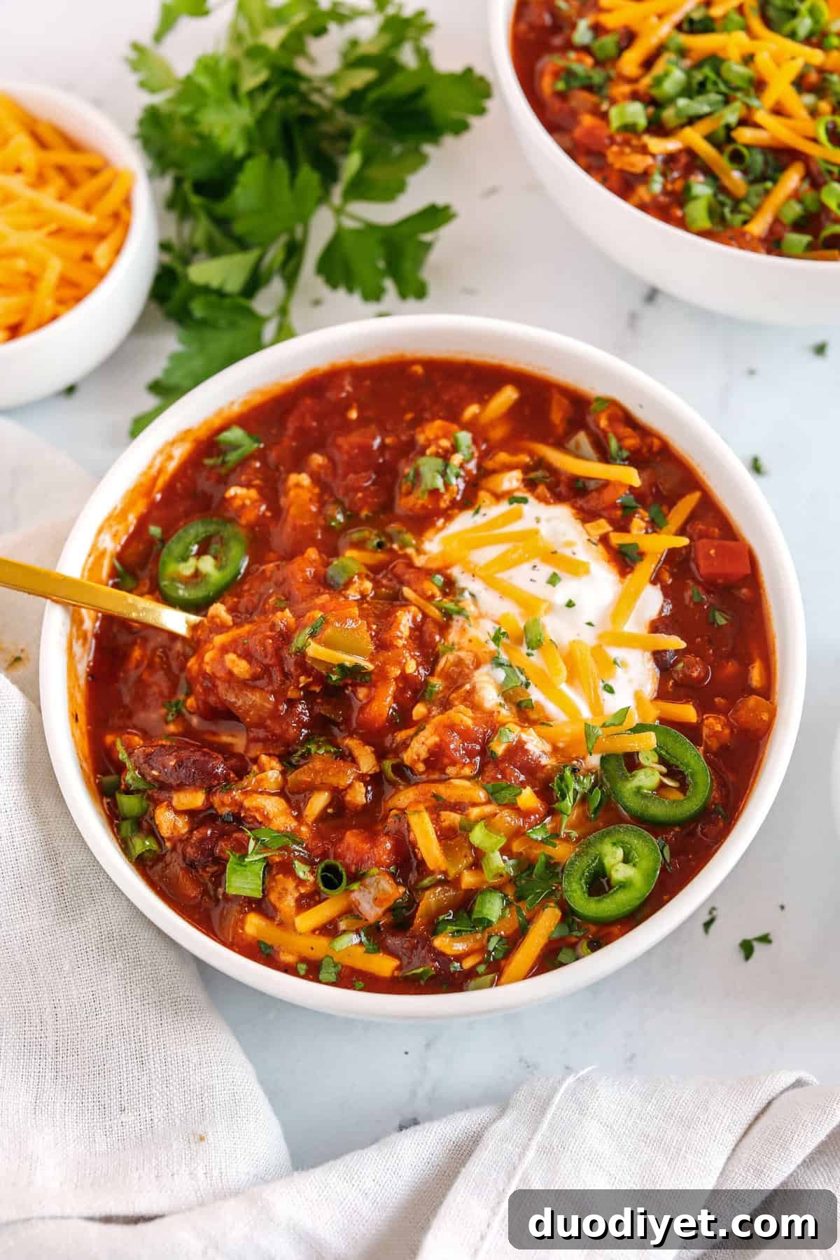 Ground Turkey Chili Recipe with Beans and Vegetables 4 The BEST Healthy Turkey Chili recipe full of fresh veggies, lean ground turkey and loaded with flavor! The perfect cozy chili you can easily make in our instant pot, crock pot or right on the stove!