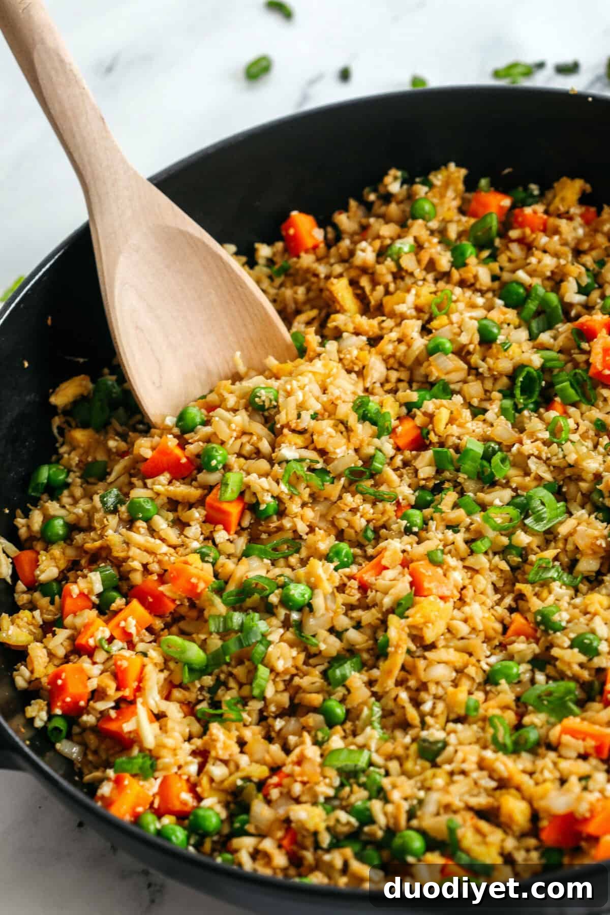 Low Carb Cauliflower Fried Rice Recipe 4 Skip the takeout and enjoy this Healthy Cauliflower Fried Rice in just 15 minutes! Packed with veggies, low in carbs and can be served as a delicious side dish or a main dish with added protein!