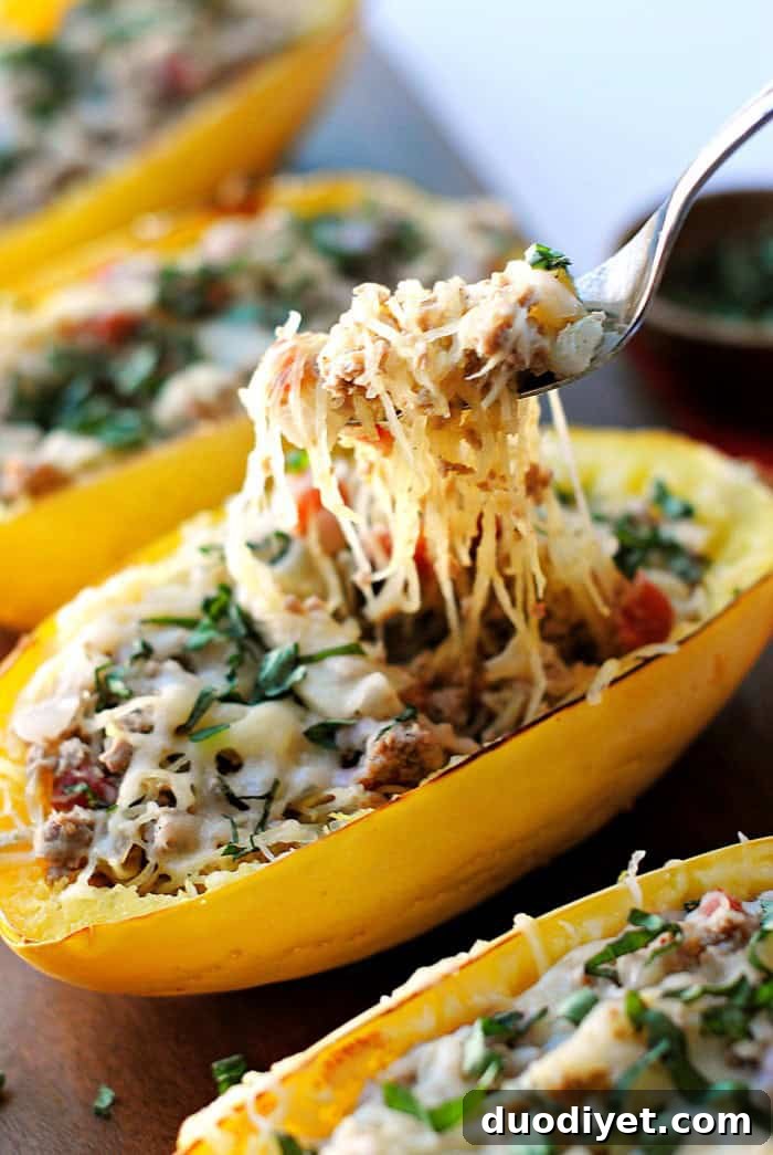 Stuffed Spaghetti Squash with Spicy Italian Sausage 3 Spaghetti Squash Boats with Spicy Sausage - closeup