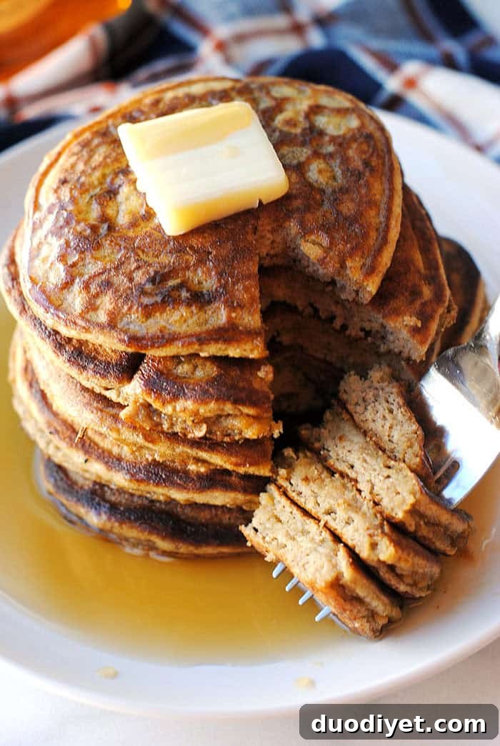 Pumpkin Oat Harvest Pancakes 3 Healthy Harvest Pancakes with syrup and toppings