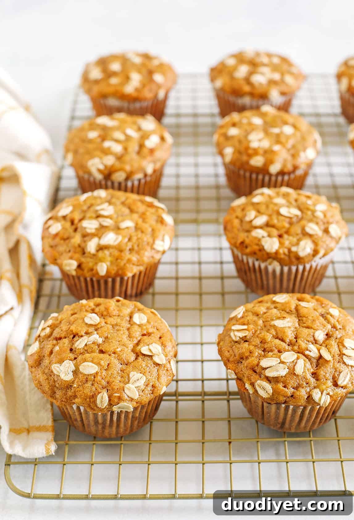 These Banana Breakfast Muffins are moist, fluffy, and made healthier with whole wheat flour, Greek yogurt, and zero butter or refined sugar. Loaded with delicious banana flavor and warm spices for the perfect morning muffin!
