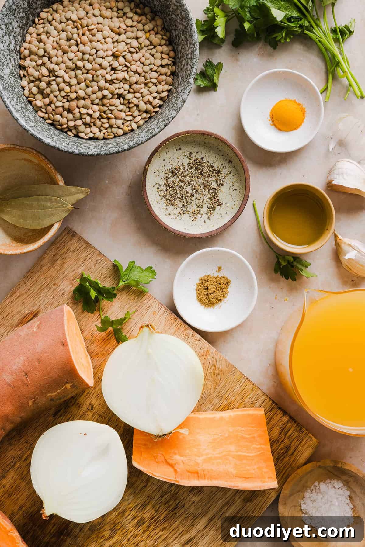 This hearty Lentil and Sweet Potato Stew is delicious, super filling and easily comes together in under 30 minutes for the perfect weeknight dinner! A nourishing meal made with pantry staples that is gluten-free, dairy-free and vegan.