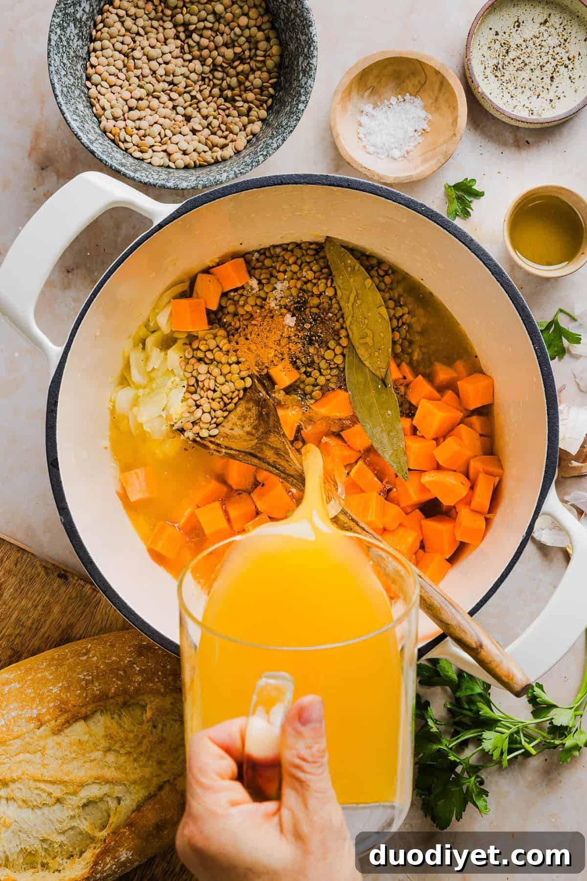 This hearty Lentil and Sweet Potato Stew is delicious, super filling and easily comes together in under 30 minutes for the perfect weeknight dinner! A nourishing meal made with pantry staples that is gluten-free, dairy-free and vegan.