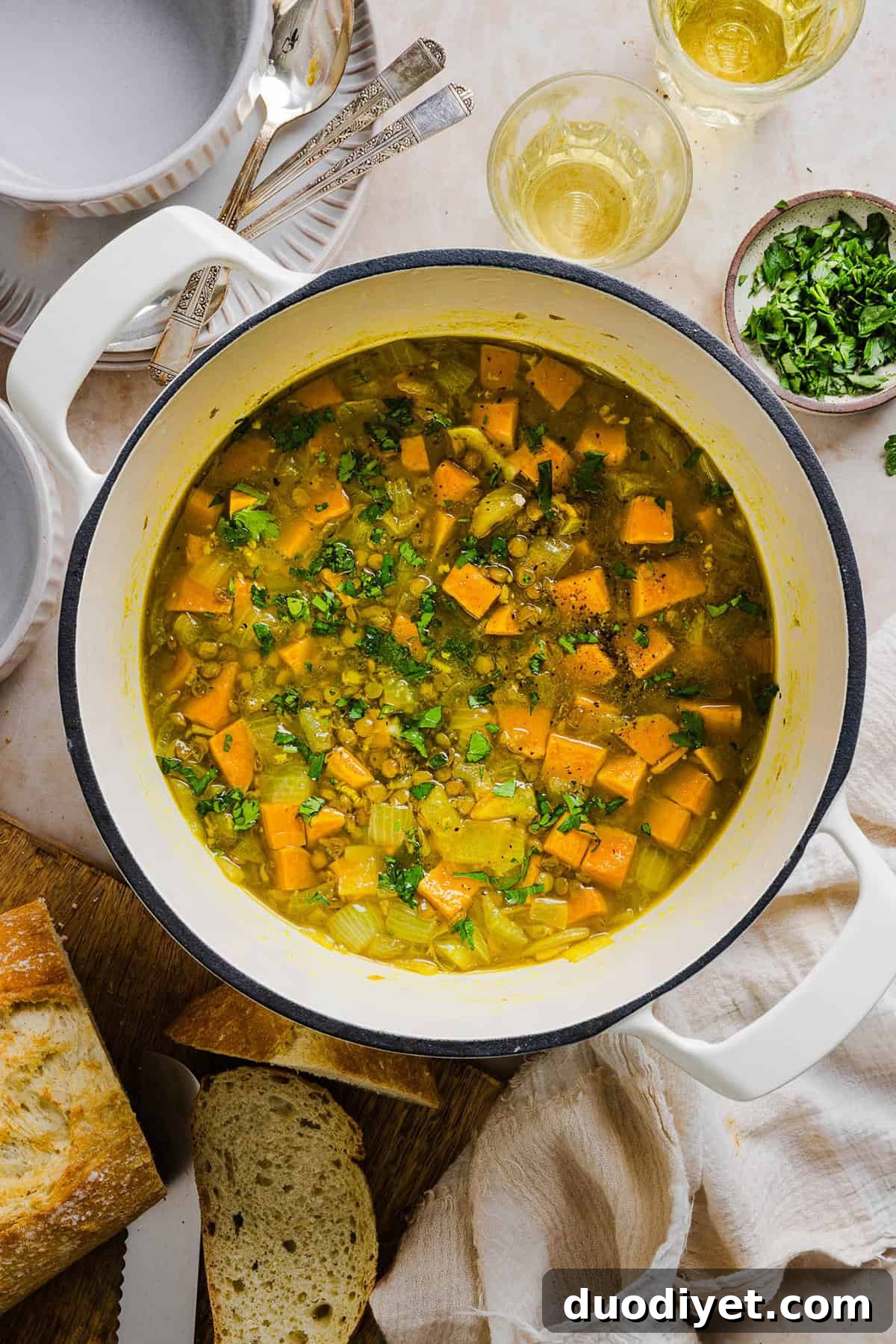 This hearty Lentil and Sweet Potato Stew is delicious, super filling and easily comes together in under 30 minutes for the perfect weeknight dinner! A nourishing meal made with pantry staples that is gluten-free, dairy-free and vegan.