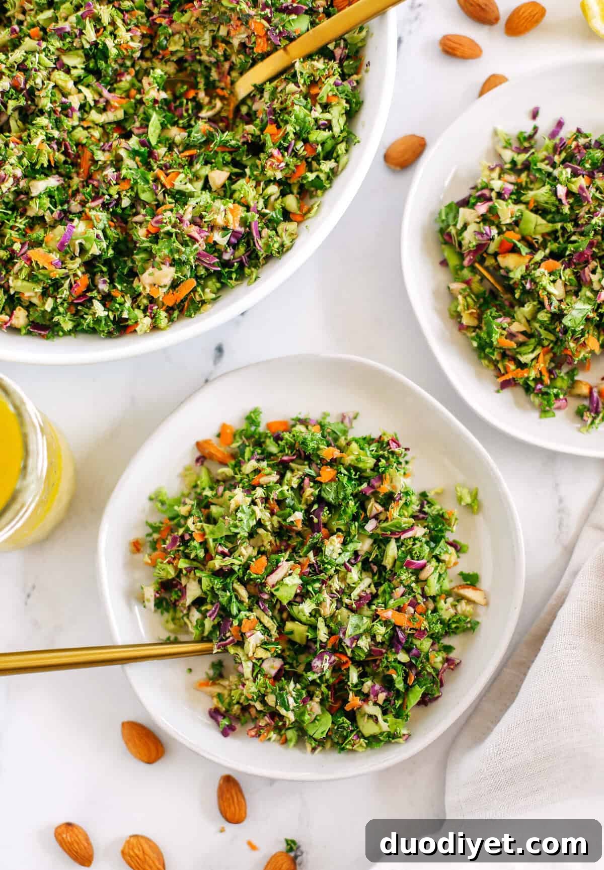 My FAVORITE Detox Salad that is healthy and loaded with fresh veggies like brussels sprouts, broccoli, kale and cabbage all drizzled with a lemony ginger dressing